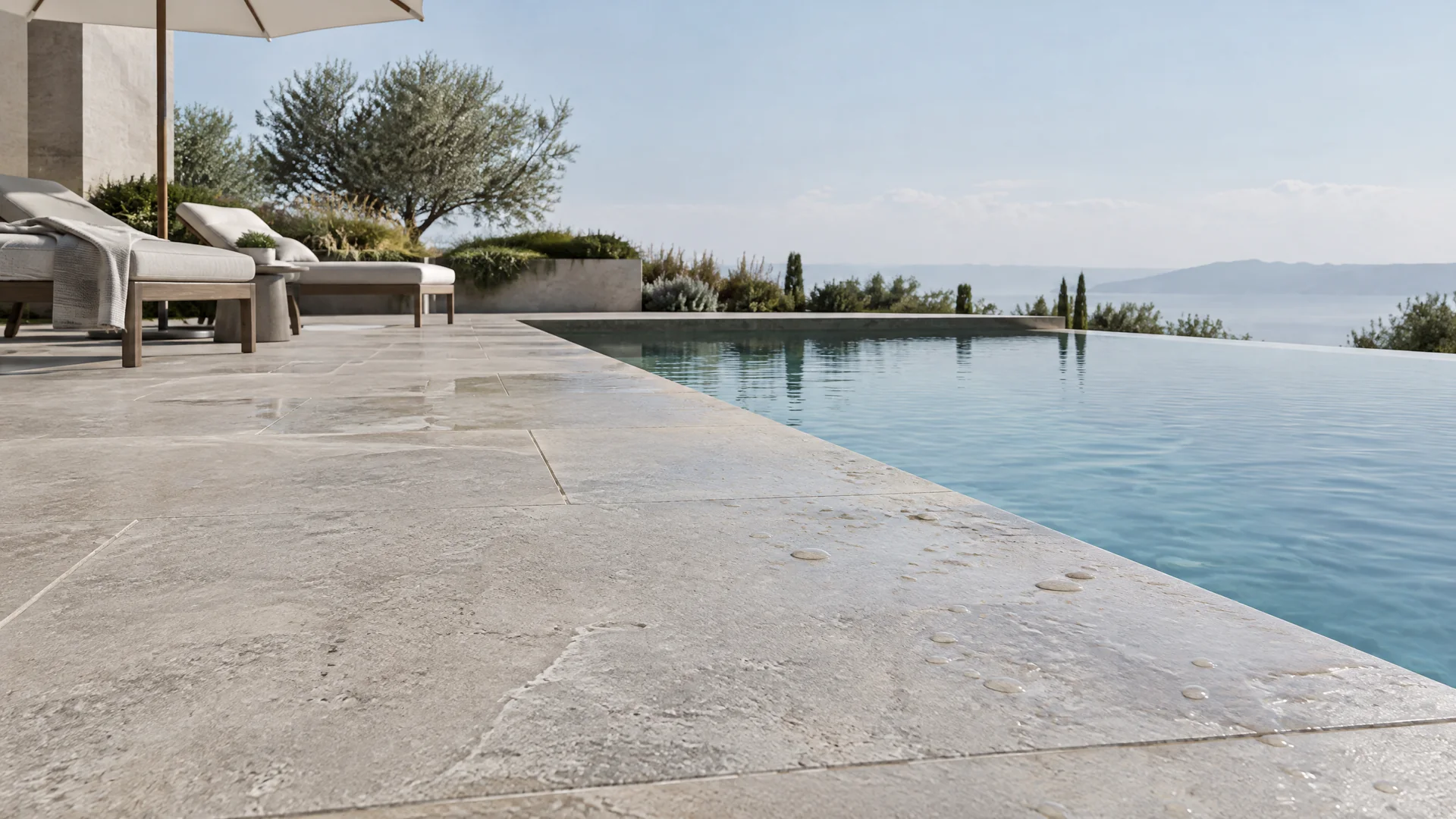Illustrative design visualization of textured natural stone paving with water droplets beside an outdoor pool
