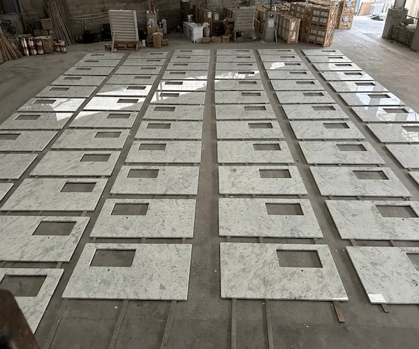 Andromeda White Granite Kitchen Top cut-to-size kitchen top components sequenced on a factory floor in a supplied fabrication reference