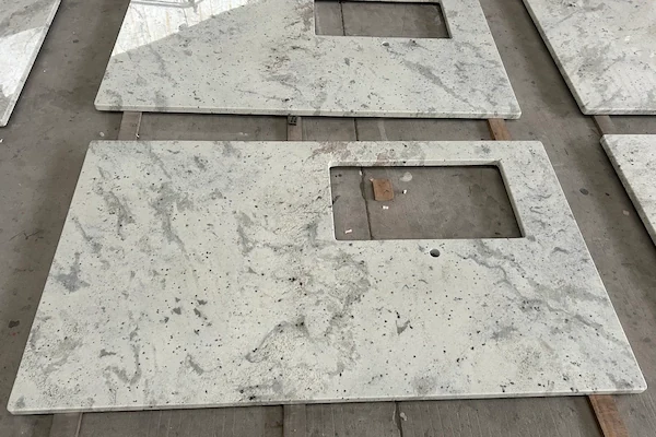 Andromeda White Granite Kitchen Top cut-to-size countertop panel with a sink cut-out in a supplied factory fabrication image