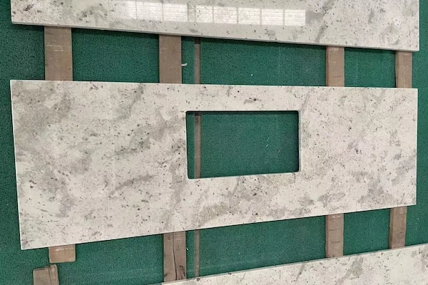 Andromeda White Granite Kitchen Top countertop components arranged for dimensional and cut-out review in a supplied production image