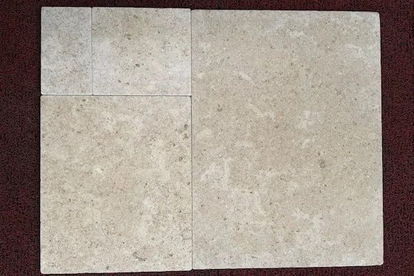 Beige Limestone Ashlar Floor Tile pale limestone tile faces and joints in a supplied material-detail image