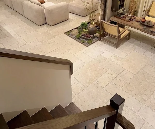 Beige Limestone Ashlar Floor Tile light-beige floor pattern shown around seating in a supplied interior reference image