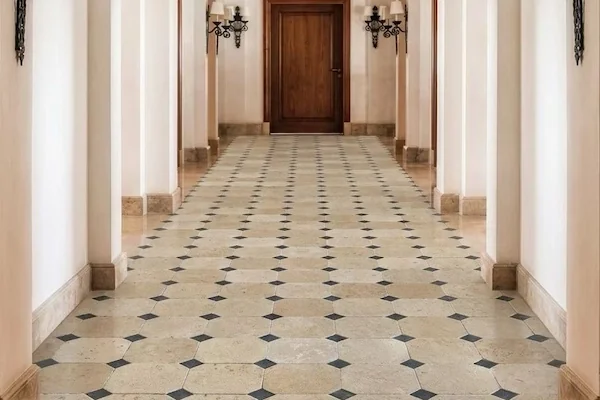 Beige Limestone Floor Tile geometric stone floor pattern shown in a supplied corridor reference image