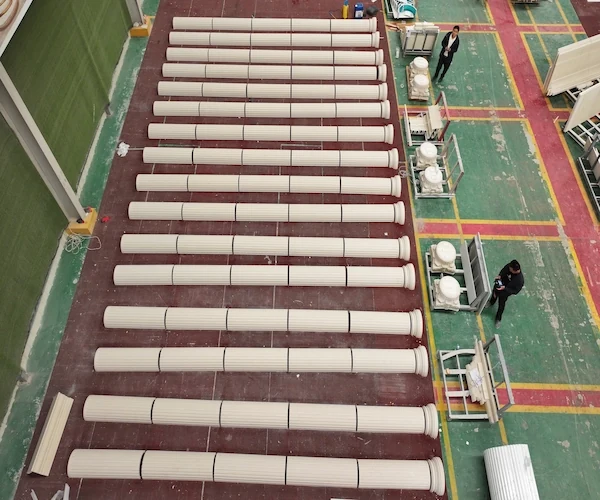 Beige Limestone column shafts dry-laid in parallel on a factory floor