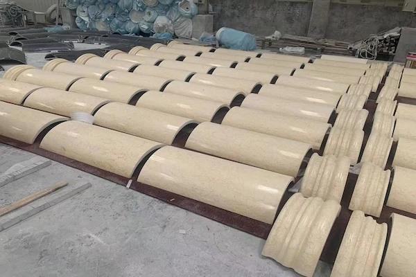 Beige Marble column shaft, capital and base components grouped for joint review