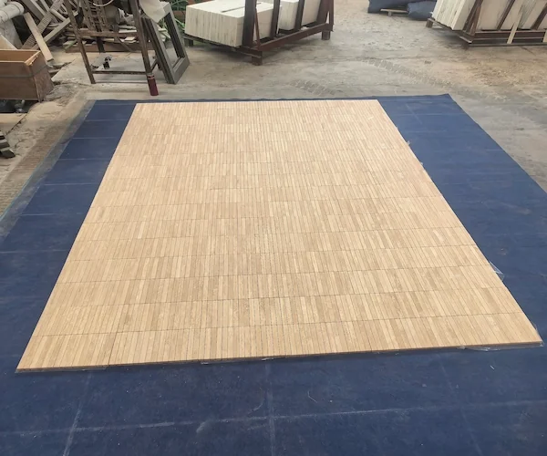 Beige Travertine Linear Mosaic shown in a supplied mesh backing and adhesive inspection reference image