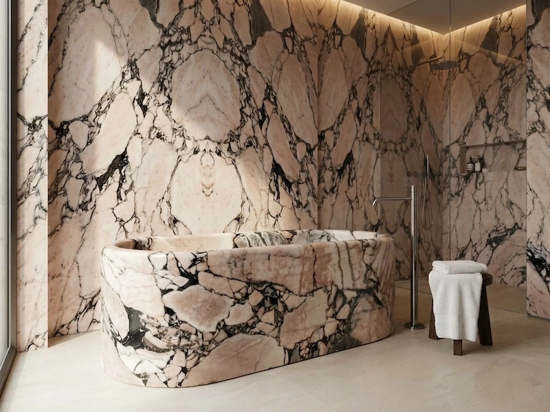 Architectural design visualization of a Calacatta Viola marble oval freestanding bathtub in a stone-clad bathroom