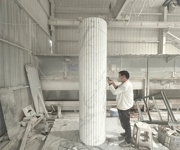 Calacatta White Marble fluted column shaft positioned upright for factory dry-lay review