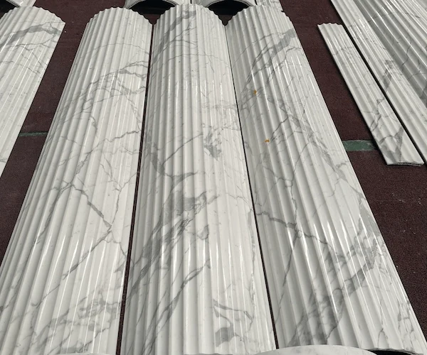 Calacatta White Marble fluted shaft components grouped for factory alignment review