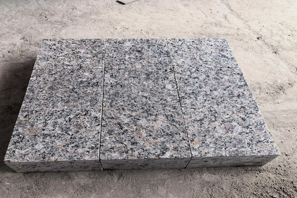Caledonia Brown Granite granite cube stone slab prepared for dry lay and export quality control