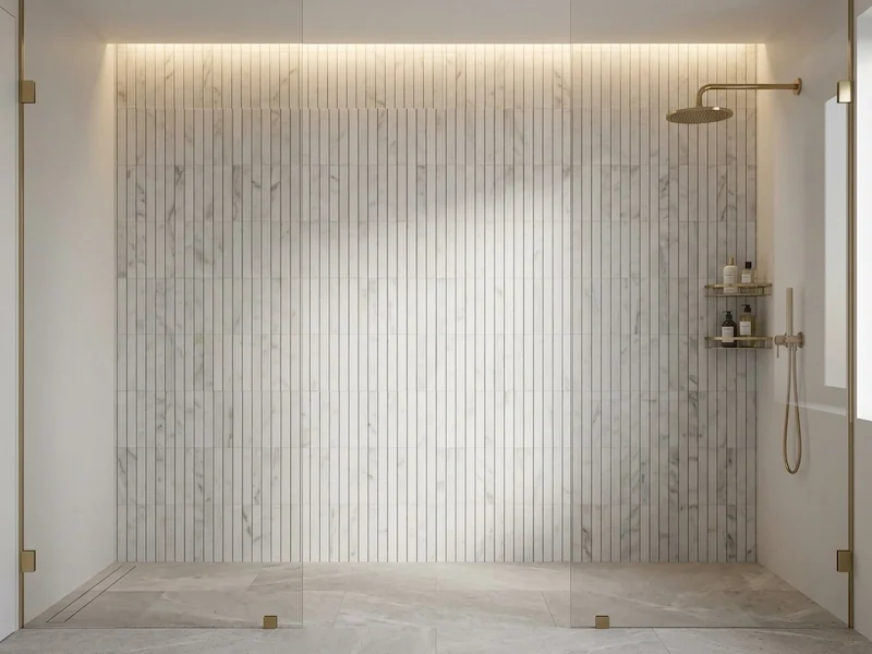Carrara White Linear Strip Marble Mosaic shown in a supplied shower-wall application reference with white and grey veined strip modules
