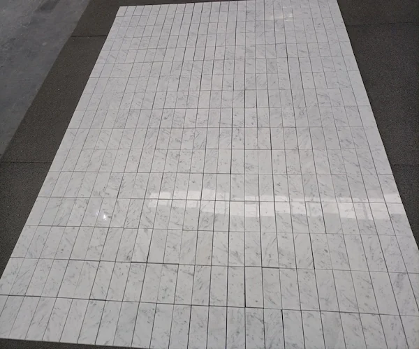 Carrara White Marble Mosaic Tile linear mosaic modules shown in a supplied shade and material-QC reference