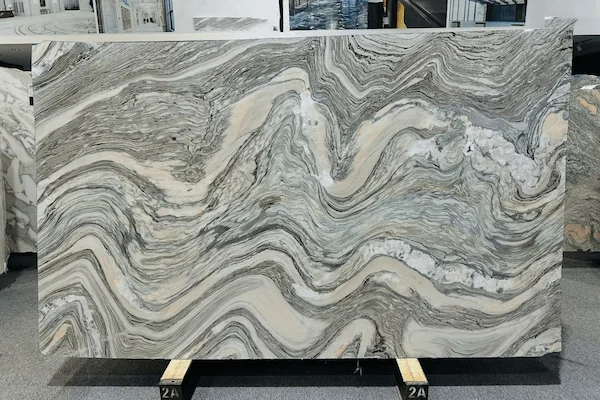 Cipollino Marble surface review showing layered grey-green movement and lighter mineral areas