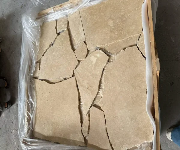 Crazy Paver Limestone loose limestone pieces shown in a supplied handling reference