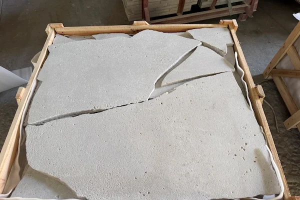 Crazy Paving Travertine Floor Tile large irregular travertine pieces shown in a supplied packing reference