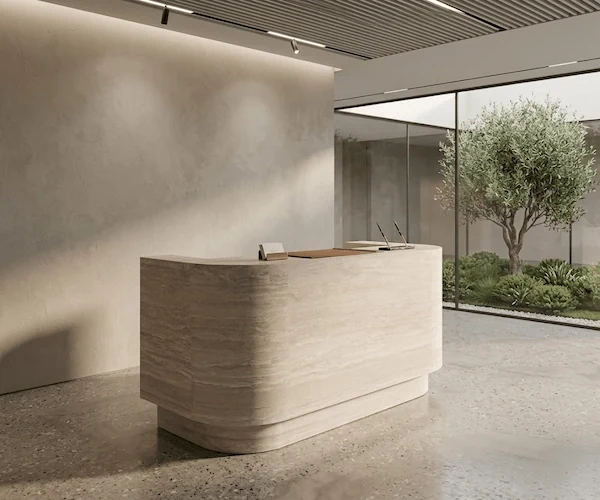 3D visualization of a rounded travertine reception counter in a contemporary interior concept