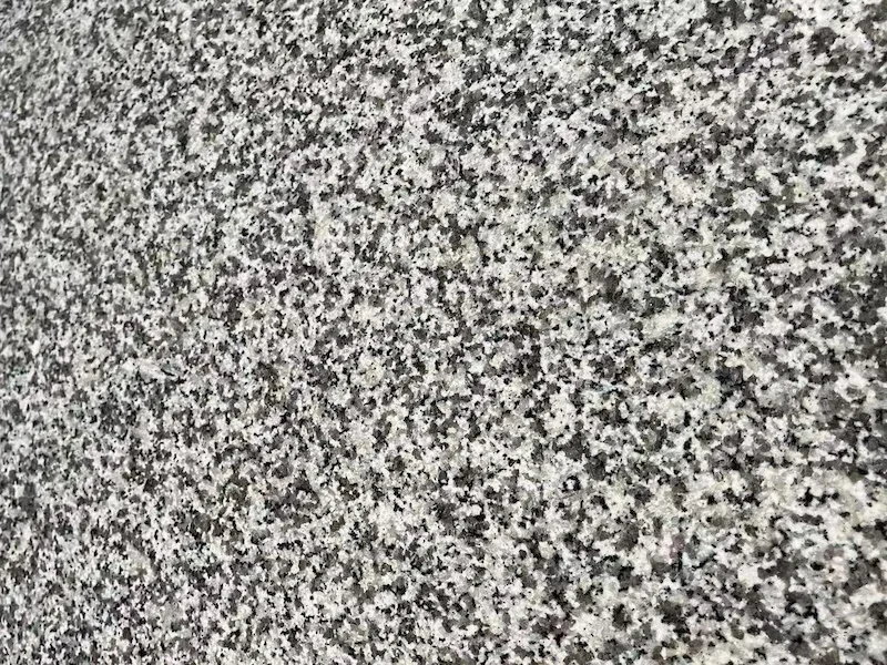 G623 Grey Granite surface with fine pale-grey, black and white mineral speckles