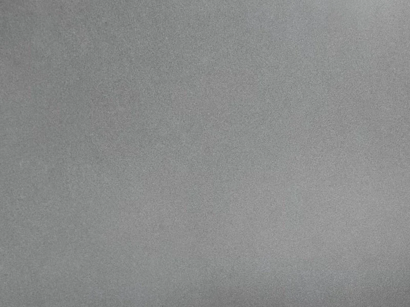 G654 Dark Grey Granite surface with dark charcoal-grey mineral variation