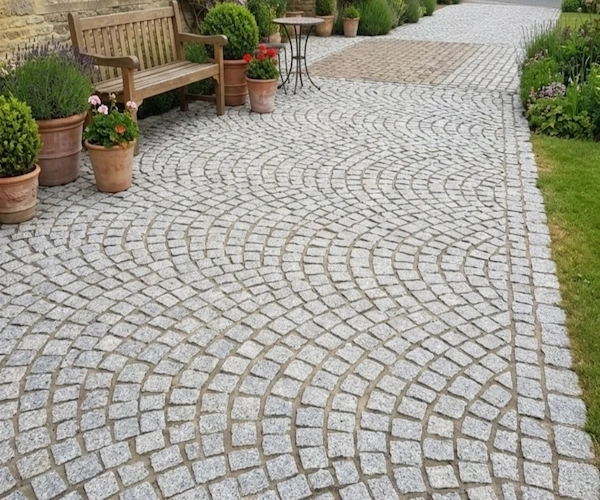 3D visualization of G654 Granite Cube Stone in a garden patio with curved fan-pattern paving