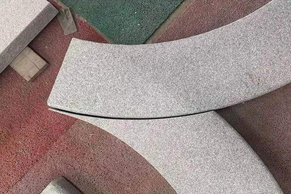 Flamed Grey Granite curved coping pieces prepared for quality inspection