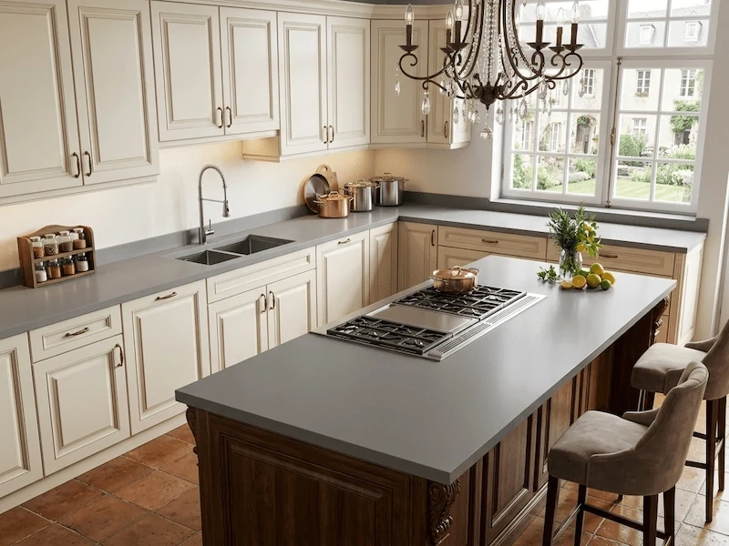 Grey Quartz Kitchen Top in a supplied kitchen application image, showing a mid-grey engineered quartz surface with restrained tonal movement