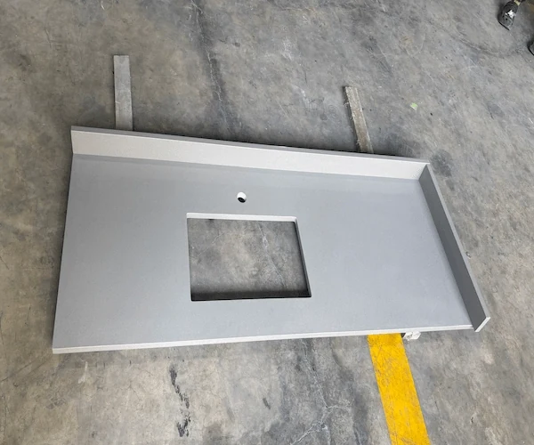 Grey Quartz Vanity Top cut-out vanity top components arranged in a supplied factory fabrication reference