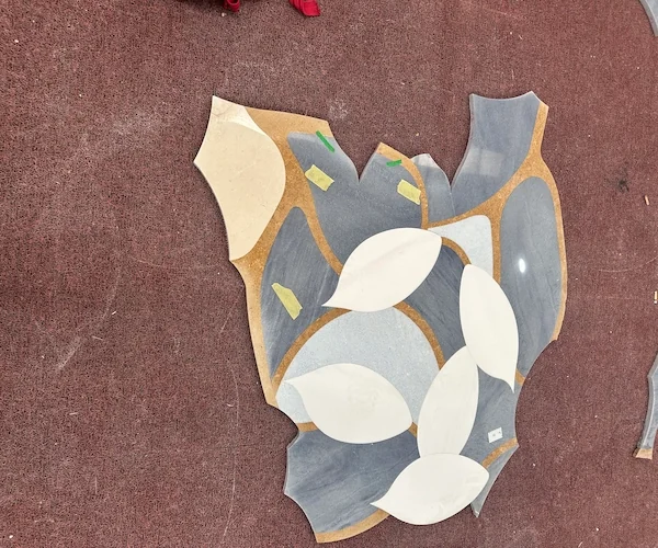 Ivory Floral Marble Waterjet Medallion shown in a supplied surface review reference image