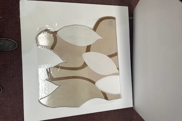 Ivory Floral Marble Waterjet Medallion shown in a supplied component assembly reference image