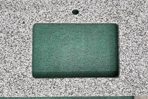 Jilin White Granite Vanity Top fabricated vanity component shown for cut-out and surface-detail review in a supplied factory image