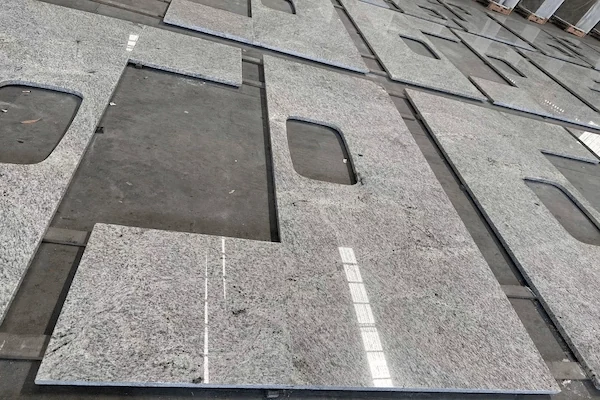 Kashmir White Granite Kitchen Top fabricated kitchen top pieces prepared for layout inspection in a supplied factory image