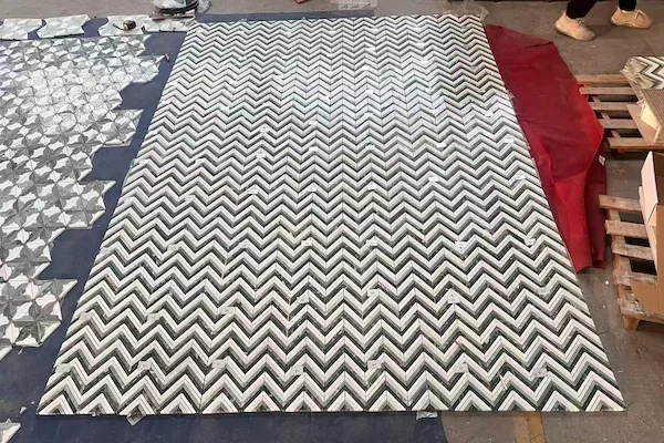 Kilkenny Chevron Marble Mosaic pattern modules shown in a supplied factory dry-lay layout review image