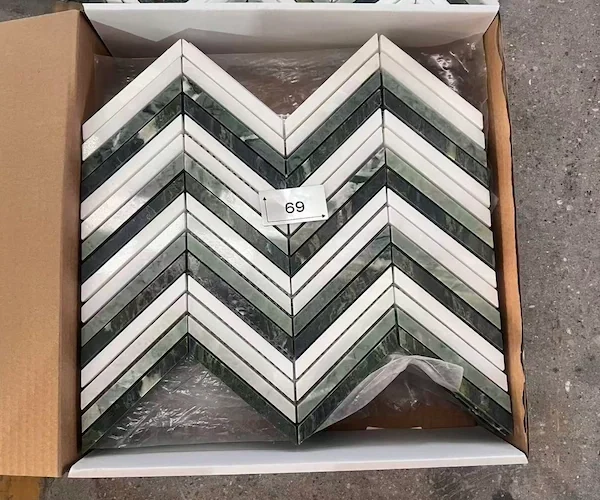 Kilkenny Chevron Marble Mosaic mosaic arrangement shown in a supplied mesh-backed layout reference image