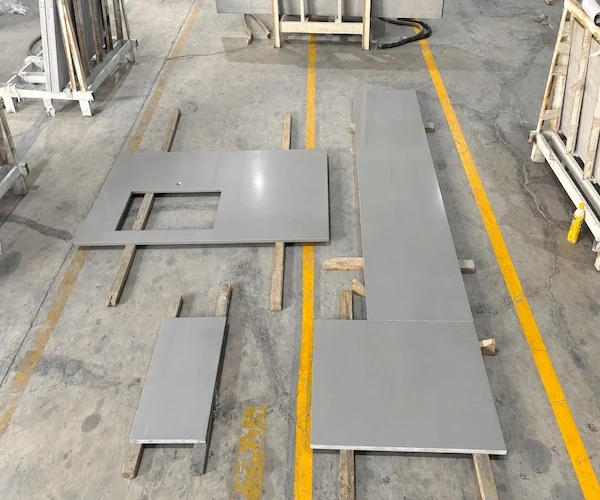 Light Grey Quartz Kitchen Top cut-to-size kitchen top components sequenced on a factory floor in a supplied fabrication reference