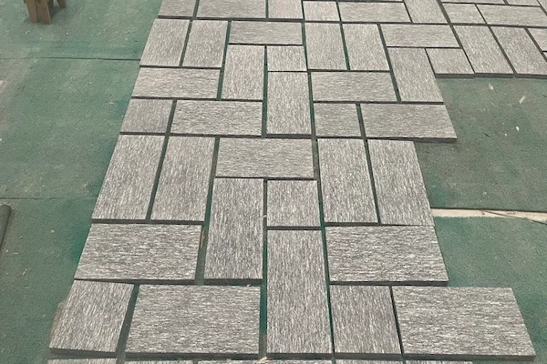 Night Snow Granite dark slabs shown in a supplied material-matching reference