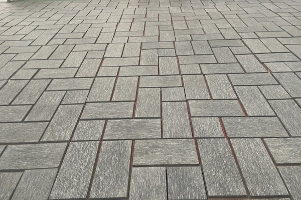 Night Snow Granite flooring tiles shown in a supplied factory inspection image