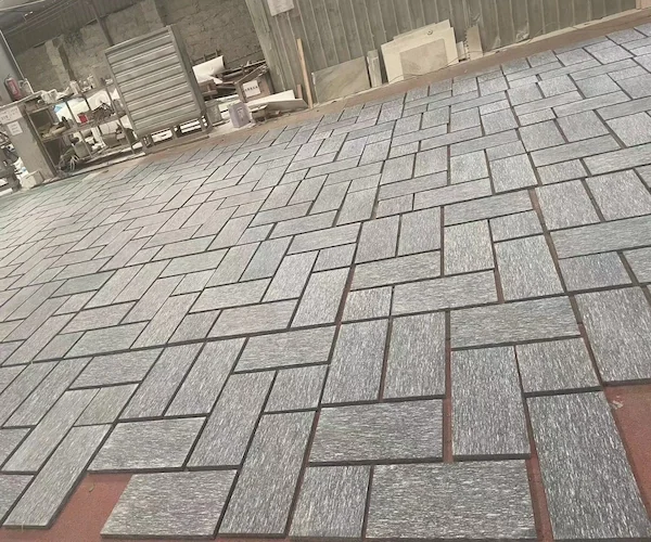 Night Snow Granite countertop pieces shown in a supplied quality-control reference