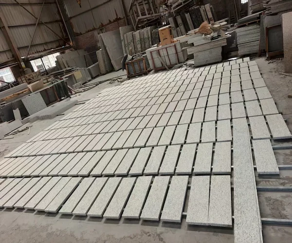 Santa Cecilia White Granite flooring pieces shown in a supplied factory quality-control reference