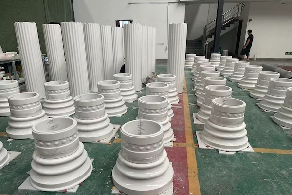 Sivec White Marble column bases and fluted shaft components aligned for assembly review