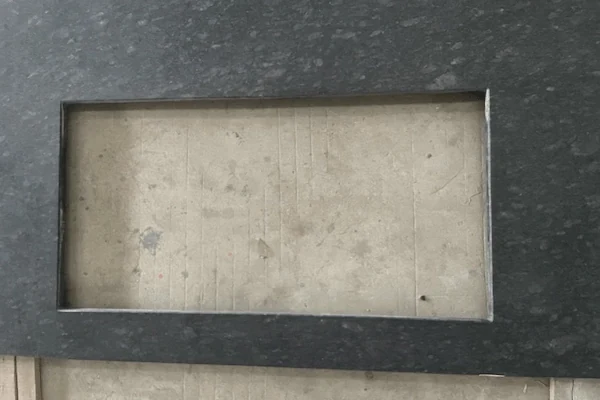 Steel Grey Granite Kitchen Top cut-to-size countertop panel with a sink cut-out in a supplied factory fabrication image