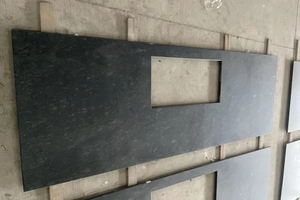 Steel Grey Granite island top pieces shown in a supplied workshop review image