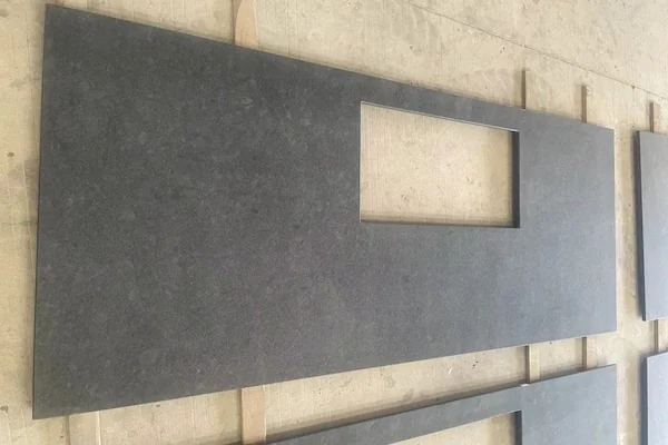 Steel Grey Granite bench top shown in a supplied inspection reference