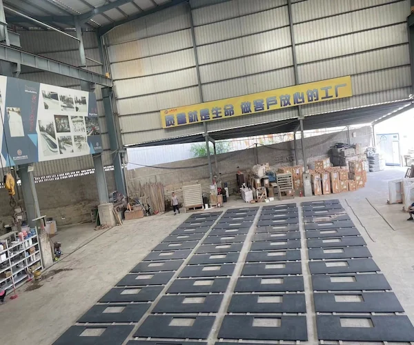 Steel Grey Granite tiles arranged for dry-lay review in a supplied factory image