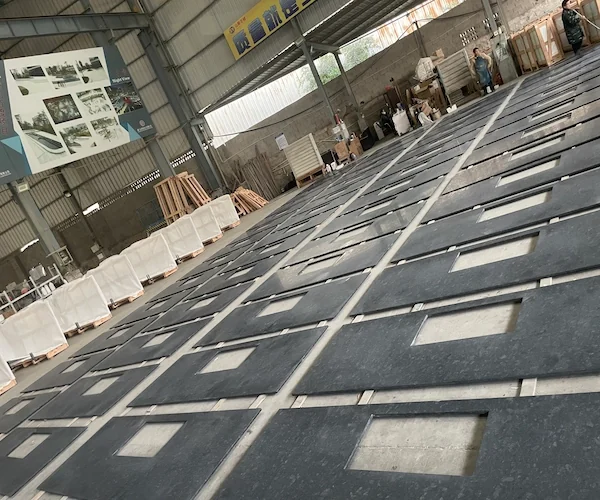 Steel Grey Granite flooring pieces shown in a supplied factory quality-control reference