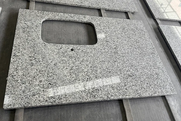 Tiger Skin Granite Kitchen Top countertop components arranged for dimensional and cut-out review in a supplied production image
