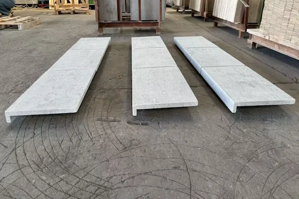 Tumbled Grey Limestone Pool Coping long coping pieces shown in a supplied handling reference