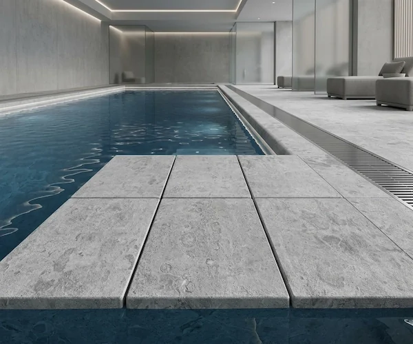 Tumbled Grey Limestone Pool Coping light-grey pool-edge pieces shown in a supplied coping application reference