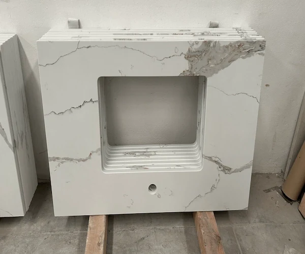 White Calacatta Quartz Vanity Top cut-out vanity top components arranged in a supplied factory fabrication reference