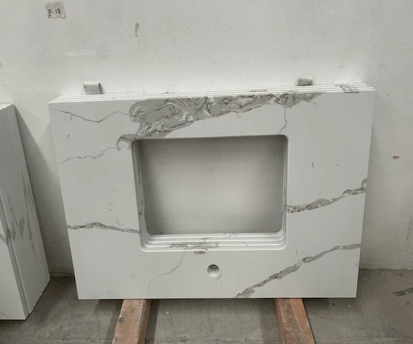 White Calacatta Quartz Vanity Top vanity top components shown in a supplied factory dry-lay or assembly reference image
