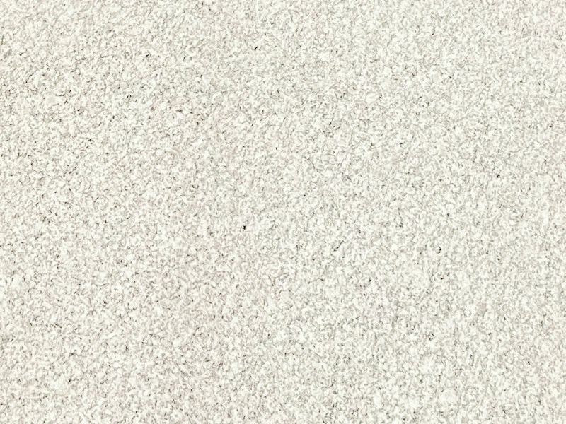 White Granite surface with light white and pale grey fine-grain mineral variation in a supplied G303 material reference