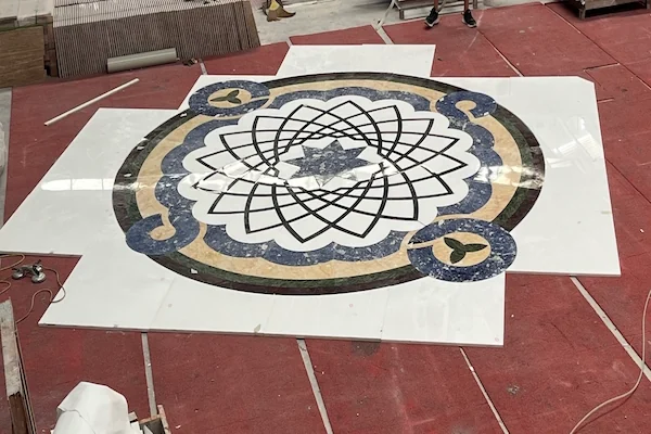 White Marble Waterjet Medallion with Blue Accents shown in a supplied dimensional layout reference image